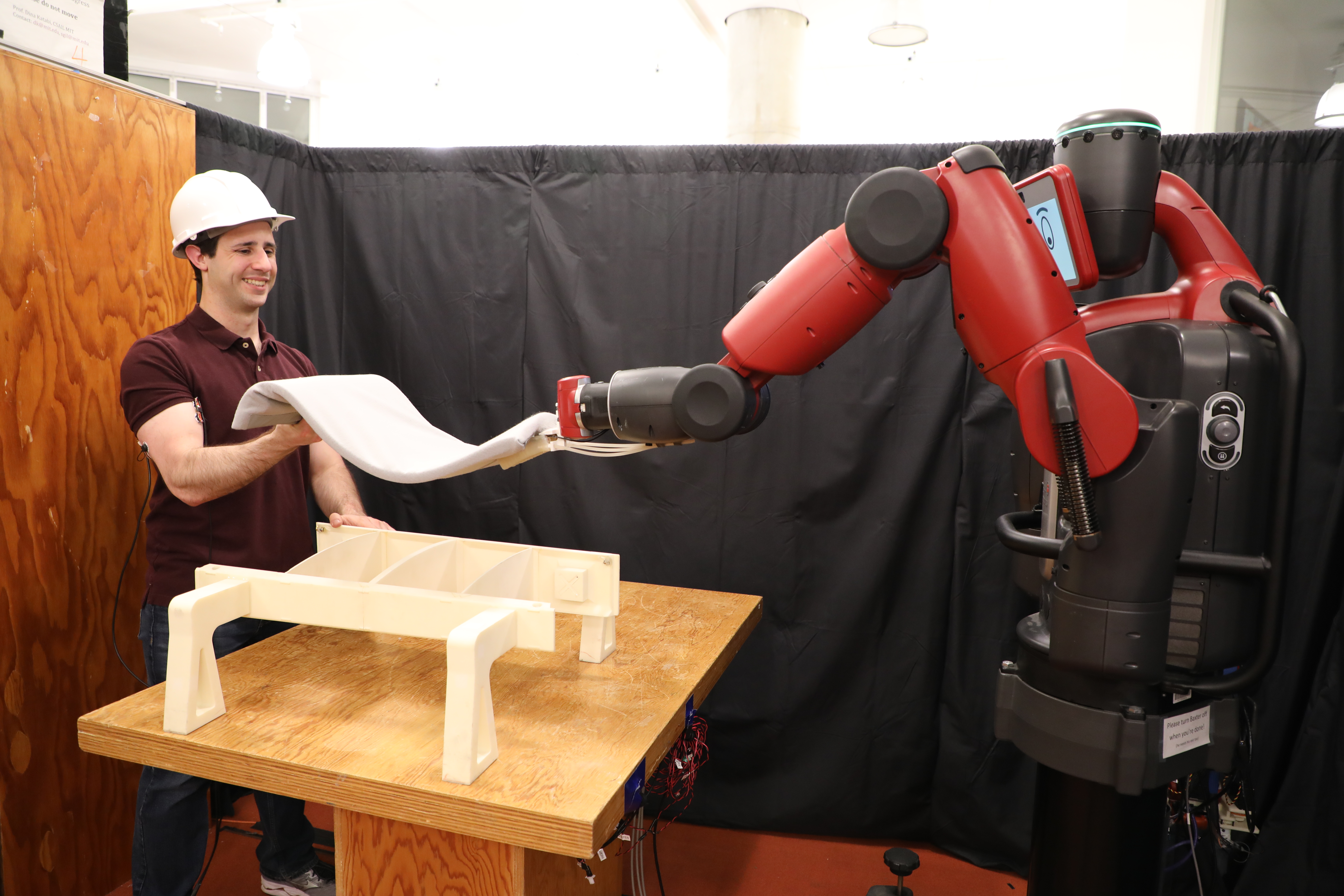 This robot helps you lift objects — by looking at your biceps | MIT CSAIL